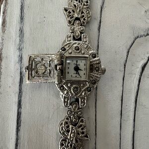 Vintage Ornate Silver Watch with Intricate Design